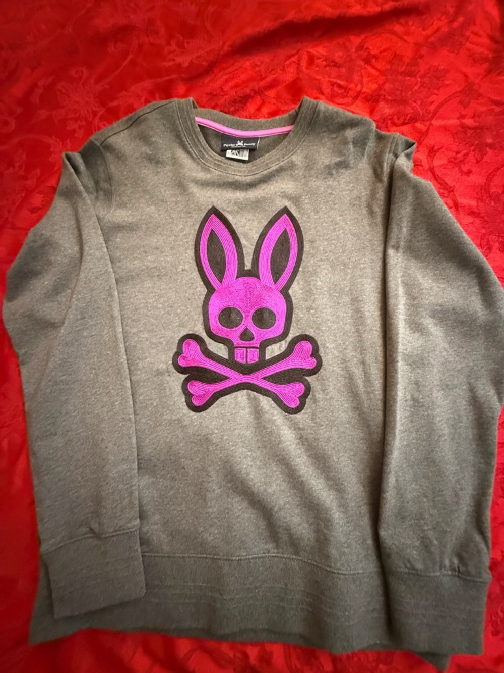 Psycho Bunny Gray Crewneck Sweater with Pink Bunny Skull Graphic